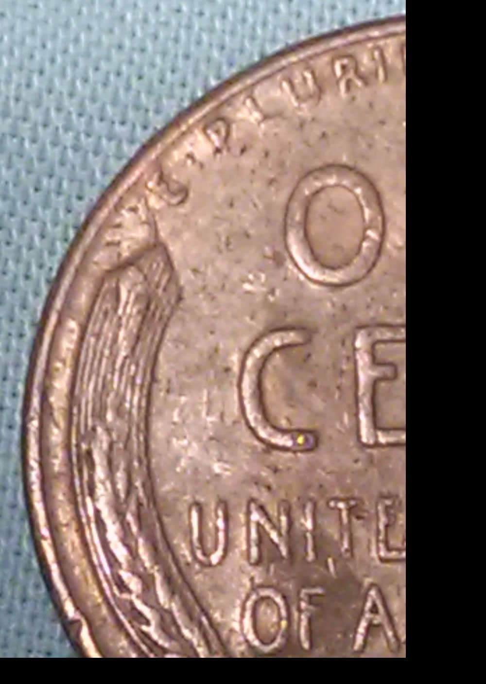 1955-P-Lincoln-Wheat-Cent-With-Severe-Cracked-Skull-And-A-RIDB-On-Reverse